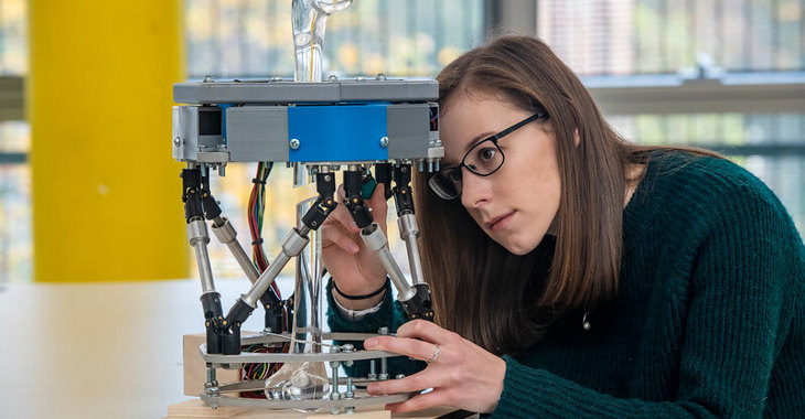 Female Biomedical Engineer With Bone Fixation Device