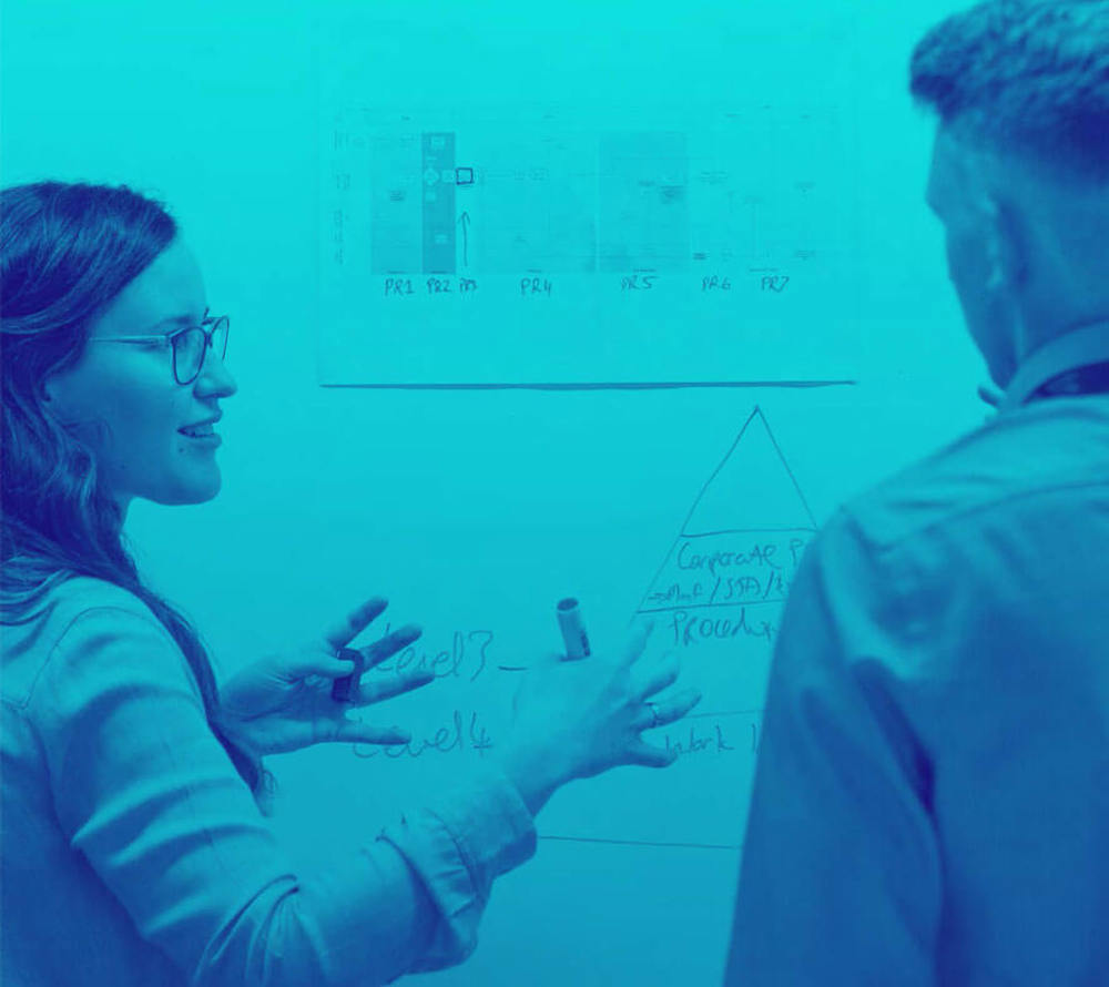 Two Engineers With Whiteboard Blue Duo