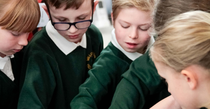 School children working together on an engineering project